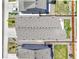 High angle aerial view displays the roof with its rectangular pattern as well as front and back yard at 27853 E 8Th Ave, Aurora, CO 80018