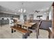 Open floor plan featuring a dining area, a modern kitchen, and a comfortable living room at 27853 E 8Th Ave, Aurora, CO 80018