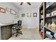 Functional home office with a desk, chair, and shelving for storage and display at 27853 E 8Th Ave, Aurora, CO 80018