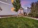 Well-manicured lawn and landscaping accentuate the exterior of this two-story home at 6894 E 133Rd Pl, Thornton, CO 80602