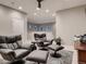 Upstairs loft area featuring comfortable seating and neutral design at 6894 E 133Rd Pl, Thornton, CO 80602