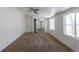 Bright bedroom features neutral carpet, fresh white walls, and a mirrored closet at 2115 W 90Th Ave, Federal Heights, CO 80260