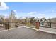 Wide outdoor deck with black railing and views of the neighborhood at 3928 N Vrain St, Denver, CO 80212
