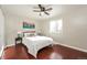 Bright bedroom with a large window, comfortable bed, and contemporary decor at 1125 Newark St, Aurora, CO 80010