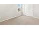 Bedroom showcasing neutral carpet, a window, and a closet at 259 E 4Th St, Berthoud, CO 80513