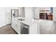 Open kitchen with stainless steel appliances, a center island with a sink and dishwasher at 259 E 4Th St, Berthoud, CO 80513