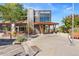 The front of Bruz Beers, shows a modern building with inviting outdoor seating at 1813 W 67Th Ave, Denver, CO 80221