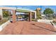 Entrance to the community garden featuring brick pathways and an inviting archway at 1813 W 67Th Ave, Denver, CO 80221