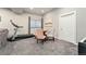 Finished basement dining area with chairs, dining table and treadmill at 1813 W 67Th Ave, Denver, CO 80221