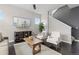 Inviting living room showcasing hardwood floors, neutral tones, and stylish decor at 1813 W 67Th Ave, Denver, CO 80221