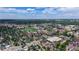 An expansive aerial view of a neighborhood and university set against a vast cityscape at 2405 S Franklin, Denver, CO 80210