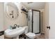 Basement bathroom with a shower and updated vanity at 10810 W 63Rd Ave # C, Arvada, CO 80004