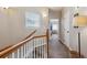 Upstairs hallway with access to bedrooms and bathroom at 10810 W 63Rd Ave # C, Arvada, CO 80004