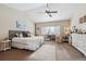 Large main bedroom with sitting area and ample closet space at 10810 W 63Rd Ave # C, Arvada, CO 80004