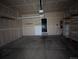 Attached garage with overhead storage at 17 Ellendale St, Castle Rock, CO 80104