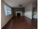 Living room with hardwood floors and a fireplace at 17 Ellendale St, Castle Rock, CO 80104