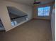 Spacious loft area with carpet and a large window at 17 Ellendale St, Castle Rock, CO 80104