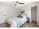Bright bedroom offers modern décor, wood-look floors, and neutral walls for a comfortable and stylish living space at 15 Hazel Ct, Denver, CO 80219
