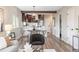 Open-concept living space with view of the kitchen and dining area at 15 Hazel Ct, Denver, CO 80219