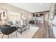 Comfortable living space with open layout and view into the modern kitchen at 15 Hazel Ct, Denver, CO 80219