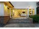 Backyard patio with a smooth transition to the living area through folding glass doors at 325 S High St, Denver, CO 80209