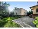 Lush lawn and landscaping enhance the backyard with a patio and accessory building at 325 S High St, Denver, CO 80209