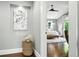 Hallway leading into bedroom with hardwood floors and natural light at 325 S High St, Denver, CO 80209