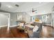 Spacious main bedroom with seating area, vaulted ceilings and ceiling fan at 325 S High St, Denver, CO 80209