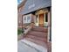 Inviting entryway with a classic wooden door and elegant awning at 2210 E Mississippi Ave # 3, Denver, CO 80210