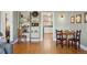 Open living space with a view into the kitchen and dining area at 2210 E Mississippi Ave # 3, Denver, CO 80210