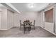 Basement features a cozy dining area with an ornate table and chairs and a window with natural light at 14713 Josephine St, Thornton, CO 80602