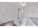 This secondary bedroom boasts light-colored walls, carpet flooring, and a closet at 14713 Josephine St, Thornton, CO 80602