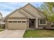 Charming single-Gathering home featuring a well-manicured lawn, two-car garage, and inviting front entrance at 14713 Josephine St, Thornton, CO 80602