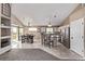 Open concept kitchen and dining area with an island and stainless steel appliances at 14713 Josephine St, Thornton, CO 80602