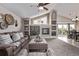 Inviting living room features built-in shelving, a cozy fireplace, and stylish decor accents at 14713 Josephine St, Thornton, CO 80602