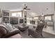 Spacious living room flows into the kitchen and dining area, offering a bright and open floor plan at 14713 Josephine St, Thornton, CO 80602