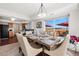 Formal dining room is set for entertaining with a window offering views of the outdoors and the backyard at 4056 Perth St, Denver, CO 80249