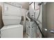 Stackable washer and dryer with Carrier HVAC system featuring efficient climate control for ultimate home comfort at 4056 Perth St, Denver, CO 80249