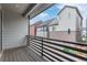 Private balcony view overlooking street of modern homes, adding an outdoor living space at 1918 W 165Th Way, Broomfield, CO 80023