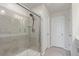 Modern bathroom showcasing a glass-enclosed shower with tiled walls at 1918 W 165Th Way, Broomfield, CO 80023