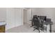 Functional bedroom with closet, desk, and ergonomic chair, perfect for work or gaming at 1918 W 165Th Way, Broomfield, CO 80023