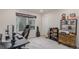 Well-lit bedroom featuring a desk, book shelves, and window with natural light at 1918 W 165Th Way, Broomfield, CO 80023