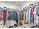 Walk-in closet with ample hanging space and shelving for clothes and storage at 1918 W 165Th Way, Broomfield, CO 80023