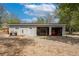 Spacious detached garage with multiple doors, ideal for workshop or storage needs at 6260 Lamar St, Arvada, CO 80003
