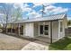 The exterior of the lovely outbuilding features durable metal roofing and convenient covered storage at 6260 Lamar St, Arvada, CO 80003