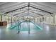 Enclosed swimming pool featuring ample lighting, a gazebo and multiple access points at 6260 Lamar St, Arvada, CO 80003