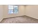 Bedroom with carpet and view to exterior at 1811 S Quebec Way # 31, Denver, CO 80231