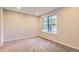 Bedroom with carpet and view to exterior at 1811 S Quebec Way # 31, Denver, CO 80231