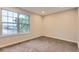 Bedroom with carpet and view to exterior at 1811 S Quebec Way # 31, Denver, CO 80231
