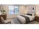 Staged bedroom with window and contemporary decor at 1811 S Quebec Way # 31, Denver, CO 80231